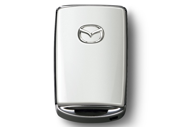 Mazda Schlusselcover in Wagenfarbe Satinweiß Metallic